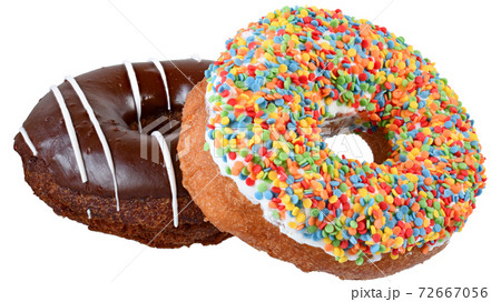 Two donut in a multicolored confectionery dressing isolated Two donut in a multicolored confectionery dressing isolated 72667056