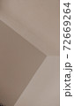 Beige background of a wall angle, or some geometrical figures. 72669264