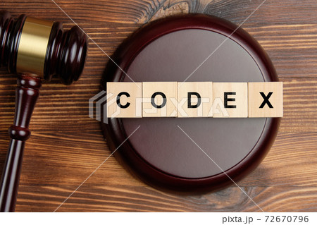 Codex word on wooden blocks next to judge hammer Codex word on wooden blocks next to judge hammer 72670796