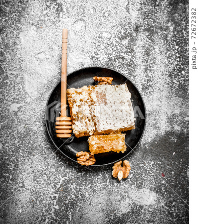 Fresh honeycomb of walnuts. 72672382