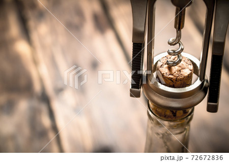 bottle of wine with corkscrew. bottle of wine with corkscrew. 72672836