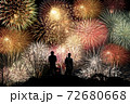 Friend  standing on the hill and watching the fireworks 72680668