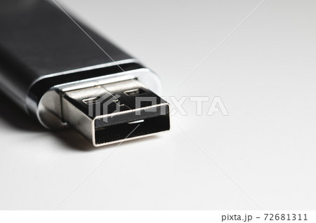 Close-up USB flash drive. Close-up on gray gradient background Close-up USB flash drive. Close-up on gray gradient background 72681311