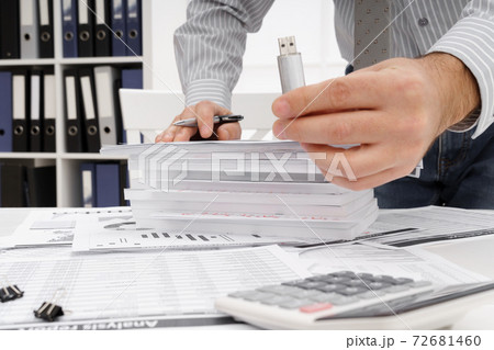 business concept - businessman's working table close view, shows the USB flash drive business concept - businessman's working table close view, shows the USB flash drive 72681460