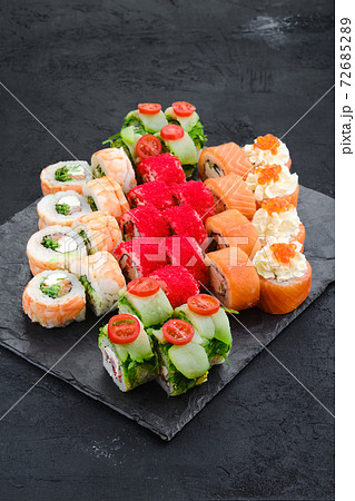 Big set of rolls with shrimp, salmon, eel, tuna and flying fish roe Big set of rolls with shrimp, salmon, eel, tuna and flying fish roe 72685289
