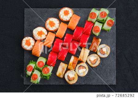 Big set of rolls with shrimp, salmon, eel, tuna and flying fish roe Big set of rolls with shrimp, salmon, eel, tuna and flying fish roe 72685292