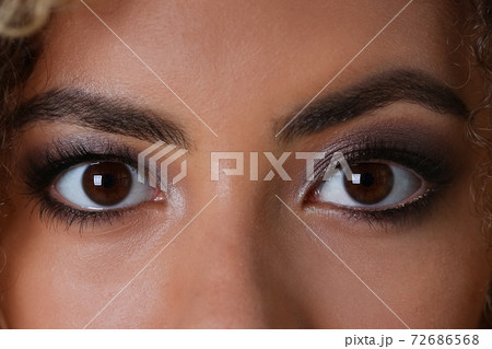 Eye of a black woman shot large macro Eye of a black woman shot large macro 72686568