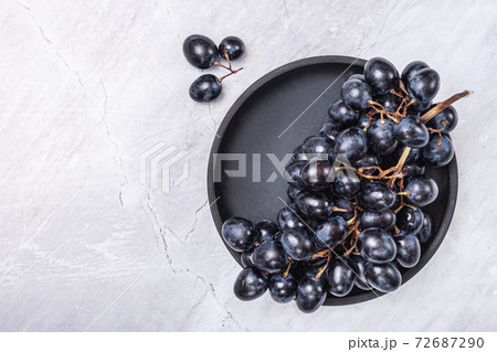 Fresh Dark blue purple grape isolated on white background. Fresh Dark blue purple grape isolated on white background. 72687290