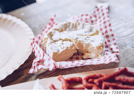 Delicious tourist breakfast on the camping. Frying scrambled eggs outdoors. 72687907