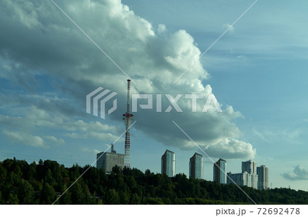 Modern city buildings among trees 72692478
