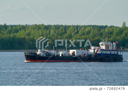 River oil tankers sailing on river 72692479