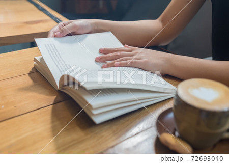 Young woman reading book in the morning Young woman reading book in the morning 72693040