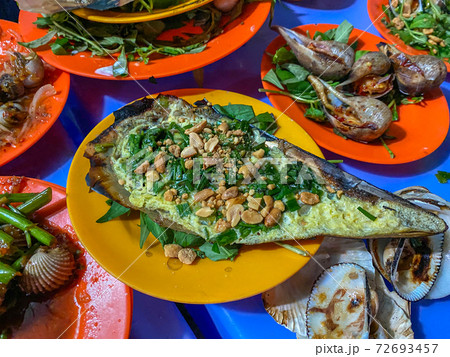 Vietnamese dish- grilled pen shell mixed with 72693457