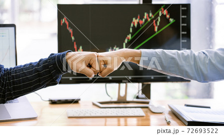 Colleagues Achievement Business Casual Fist bump together after dealing mission business, Business success and teamwork concept Colleagues Achievement Business Casual Fist bump together after dealing mission business, Business success and teamwork concept 72693522