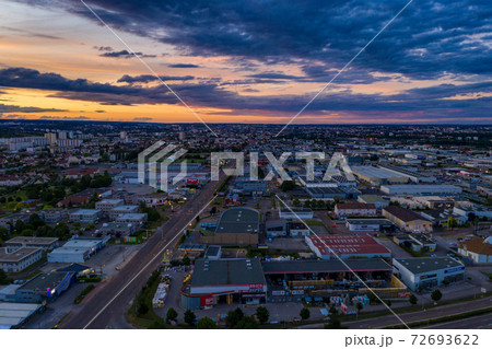 Dijon city townscape view under colorful nightfall summer sky Dijon city townscape view under colorful nightfall summer sky 72693622
