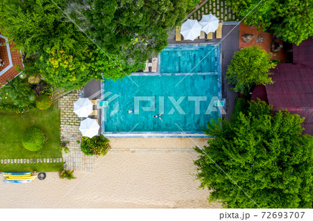 Beautiful aerial view of luxury summer swimming pool  72693707