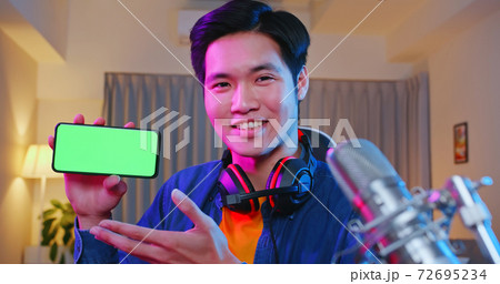 asian man have live stream 72695234