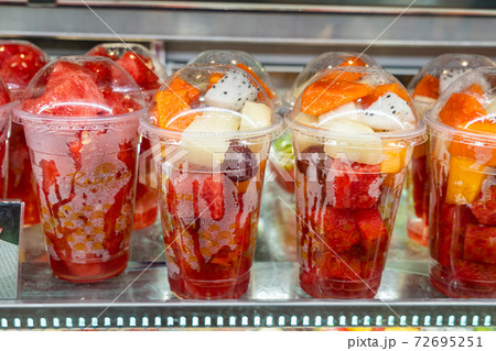 Fruit cups for sale displayed at dessert 72695251