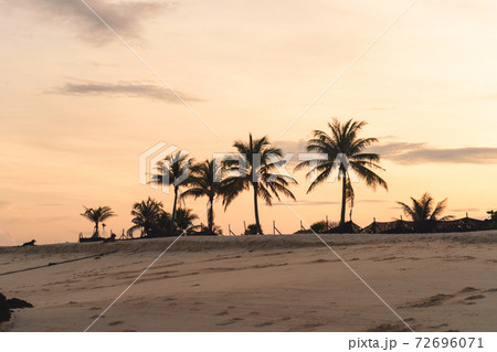 The beach in the morning on Koh Lipe and Long tail boat in the morning The beach in the morning on Koh Lipe and Long tail boat in the morning 72696071