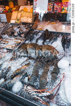 Shrimp, scallop shellfish, fresh in front of a restaurant on the island 72696109