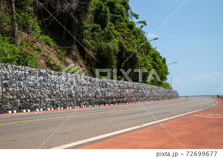 Retaining wall, Rock wall, Landslide prevention fence, Landslide protection along the roadside. 72699677