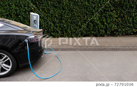 Electric car with a charging station  72701036