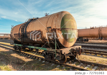 Grunge petroleum waggon on the railroad Grunge petroleum waggon on the railroad 72701063