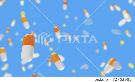 カラフルなカプセル型の薬が沢山並んでいる画像 72702989