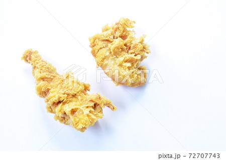 crispy fried chicken meat with bread crumb and egg yolk on white background crispy fried chicken meat with bread crumb and egg yolk on white background 72707743