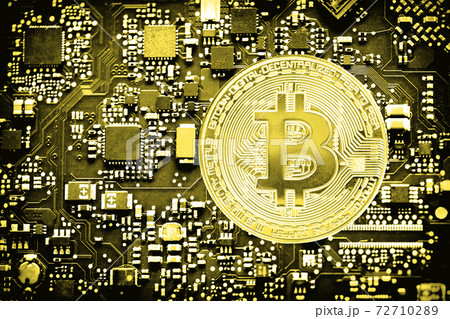 Digital currency bitcoin on computer chip Digital currency bitcoin on computer chip 72710289