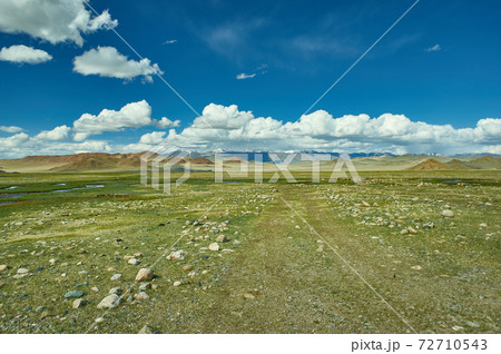 Mongolian Altai. Scenic valley on the background of the snowcapped mountains. Mongolian Altai. Scenic valley on the background of the snowcapped mountains. 72710543