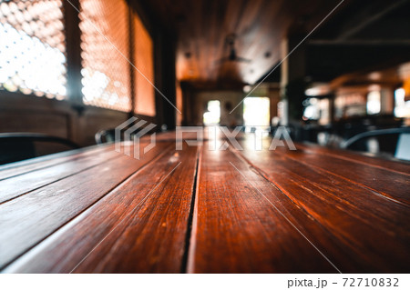 Wooden table and hotel background 72710832