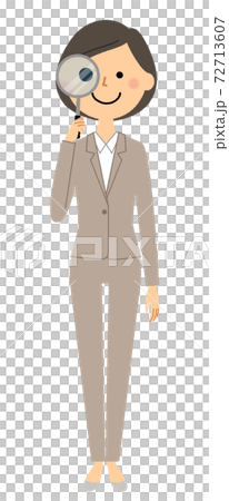 Woman in suit looking through magnifying glass 72713607