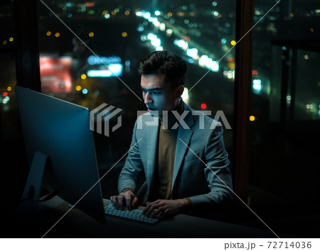 Serious Man Complete Work at Night 72714036