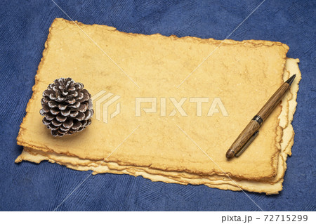 stack of tan toned deckle edge paper sheets stack of tan toned deckle edge paper sheets 72715299