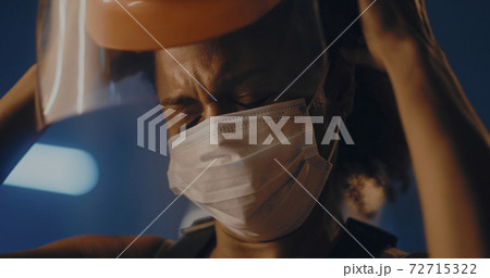 Hardworking female laborer after difficult day on manufacture 72715322