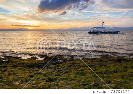 Sunset at the Moalboal beach, Philippines Sunset at the Moalboal beach, Philippines 72735174