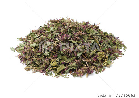 Pile of dry Origanum vulgare flowers. Dried wild marjoram heap on white. Pile of dry Origanum vulgare flowers. Dried wild marjoram heap on white. 72735663