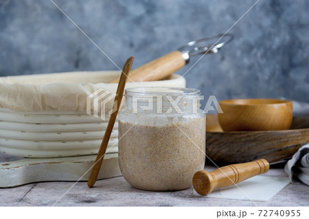 Starter sourdough. Baking homemade bread with wild sourdough and wholemeal flour. 72740955
