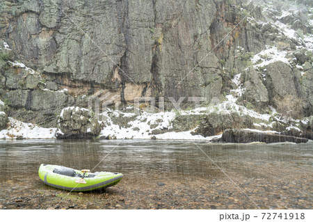 inflatable whitewater kayak in spring snowstorm inflatable whitewater kayak in spring snowstorm 72741918