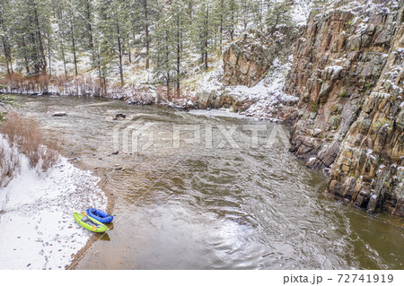 inflatable kayak and packraft on a river - aerial view inflatable kayak and packraft on a river - aerial view 72741919