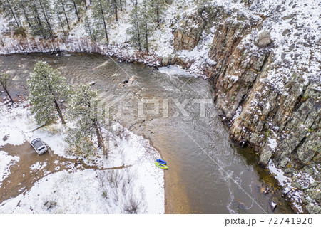 inflatable kayak and packraft on a river - aerial view 72741920