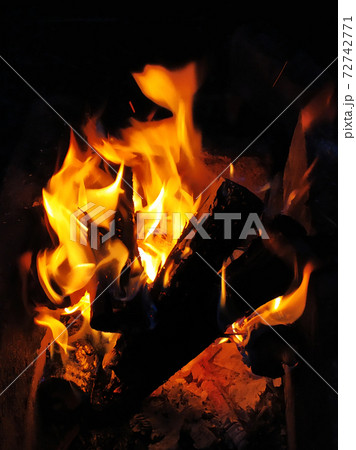 Fire flames in a bonfire at night Fire flames in a bonfire at night 72742771