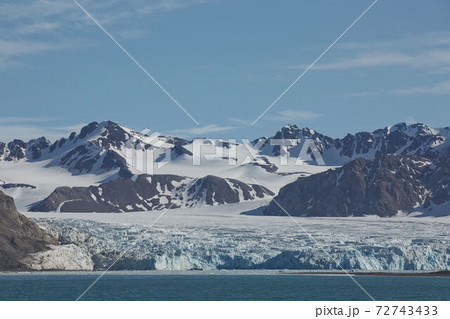 Mountains, glaciers and coastline landscape close to a village called Ny-Alesund located at 79 degree North on Spitsbergen Mountains, glaciers and coastline landscape close to a village called Ny-Alesund located at 79 degree North on Spitsbergen 72743433