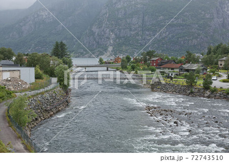 The village of Eidfjord in Norway is a major cruise ship port of call. It is situated at the end of the Eid Fjord, an inner branch of the large Hardangerfjorden 72743510