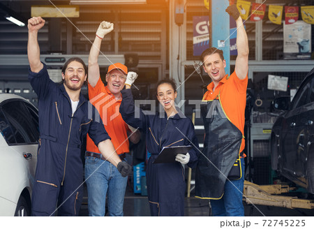Group of mechanics, Professional Mechanic in the garage. Auto repair garage. Group of mechanics, Professional Mechanic in the garage. Auto repair garage. 72745225