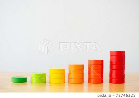 Wood block multicolor arranging stack step as staircase on wooden table Wood block multicolor arranging stack step as staircase on wooden table 72746225