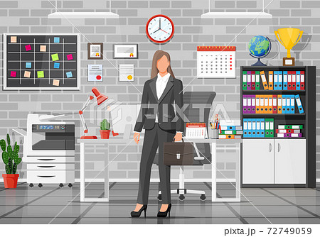 Office building interior with businesswoman 72749059