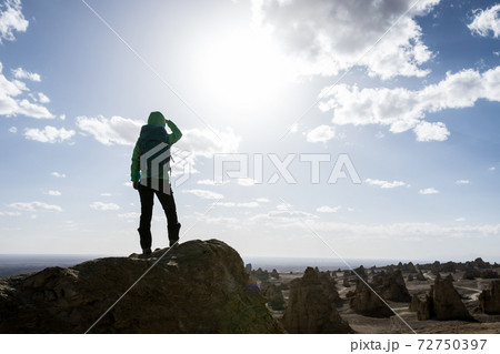 Hiking on sand desert looking at the view 72750397