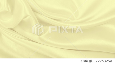 Smooth elegant golden silk or satin luxury cloth texture as wedding background. Luxurious background design. In Sepia toned. Retro style 72753258